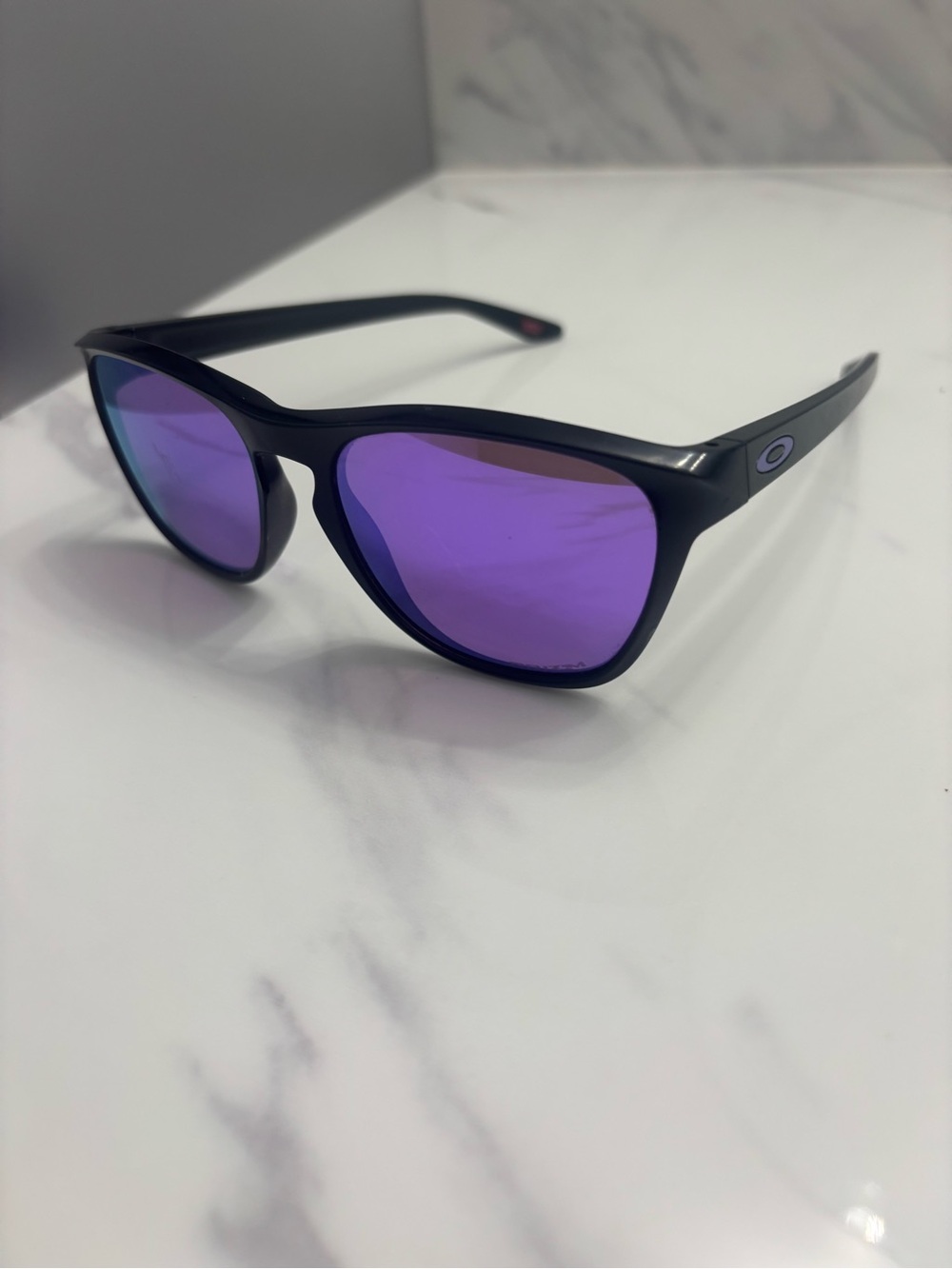 Oakley Black Frame Sunglasses with Purple Mirrored Lenses